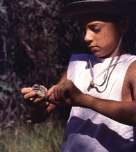 Diego helping with mist-netting. Cazorla, Aug 1990